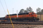 BNSF 1631 and 1585 shoving freight around the yard